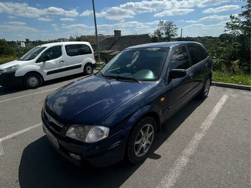 Авто Mazda 323 2000 № 8461667