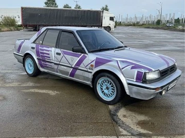 Авто Nissan Bluebird 1990 № 8468446