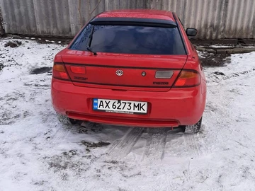 Авто Mazda 323 1996 № 8493845