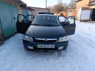 Авто Mazda 323 1998 № 8504951