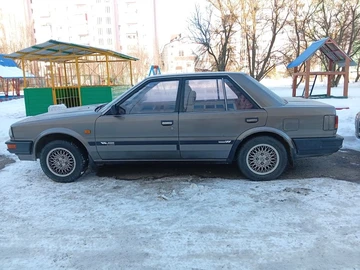 Авто Nissan Bluebird 1988 № 8515738