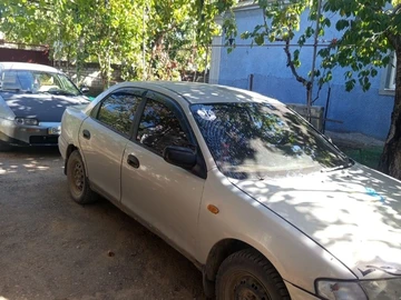 Авто Mazda 323 1997 № 8516208