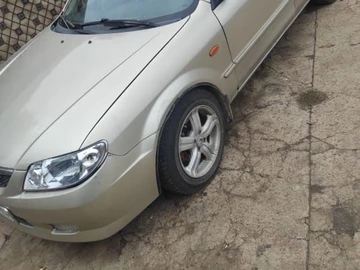 Авто Mazda 323 2002 № 8519531