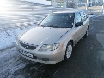 Авто Mazda 323 2003 № 8523355
