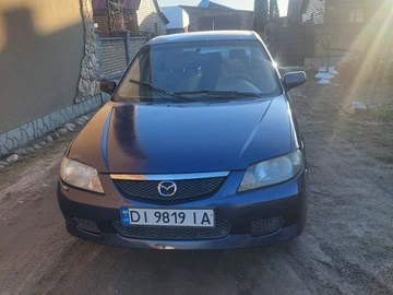Авто Mazda 323 2001 № 8530903