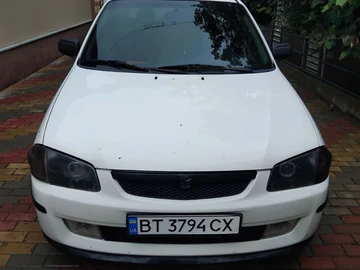 Авто Mazda 323 1999 № 8535531