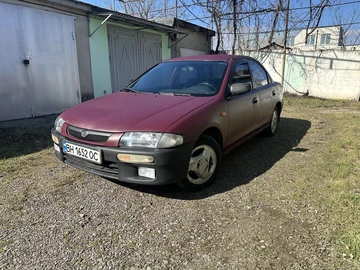 Авто Mazda 323 1997 № 8546521