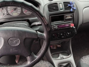 Авто Mazda 323 1999 № 8553965