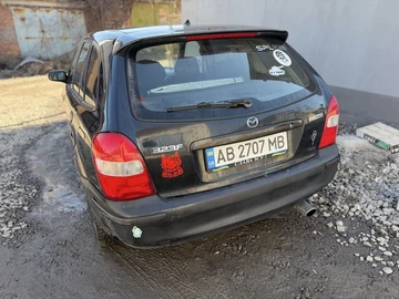 Авто Mazda 323 2000 № 8561689