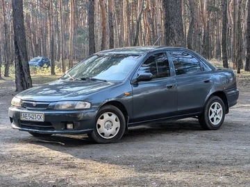Авто Mazda 323 1997 № 8574737