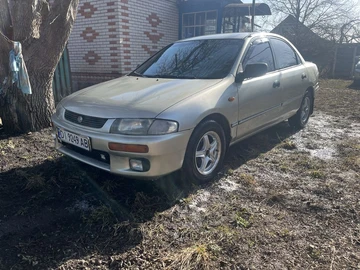 Авто Mazda 323 1997 № 8582543