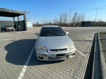 Авто Mazda 323 1997 № 8584242