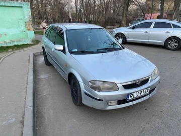 Авто Mazda 323 1999 № 8584448