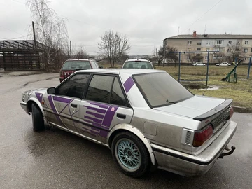 Авто Nissan Bluebird 1990 № 8587476