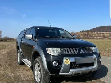 Авто Mitsubishi L 200 2009 № 8594799