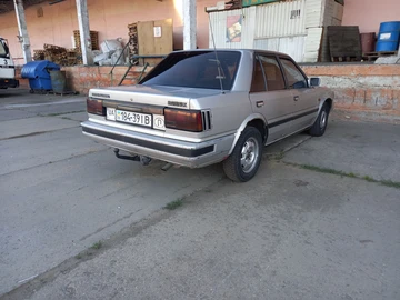 Авто Nissan Bluebird 1987 № 8595106