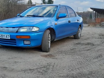 Авто Mazda 323 1998 № 8595544