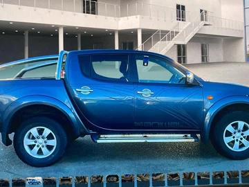 Авто Mitsubishi L 200 2009 № 8602649
