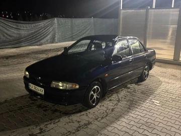 Авто Mitsubishi Lancer 1994 № 8606529