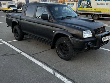 Авто Mitsubishi L 200 2003 № 8607183