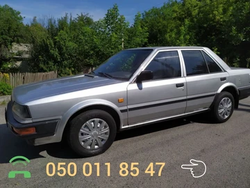 Авто Nissan Bluebird 1988 № 8607513
