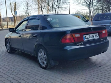 Авто Mazda 323 1996 № 8613452