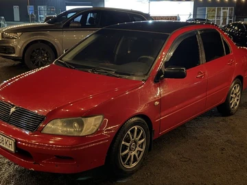 Авто Mitsubishi Lancer 2002 № 8613653