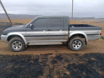 Авто Mitsubishi L 200 2004 № 8618933