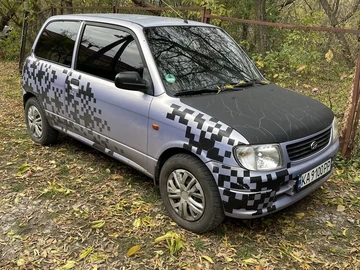 Авто Daihatsu Cuore 2003 № 8619031