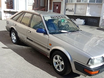 Авто Nissan Bluebird 1987 № 8619198