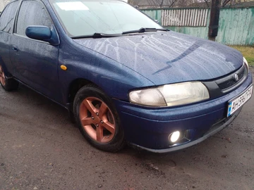 Авто Mazda 323 1998 № 8629264