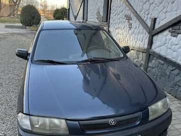 Авто Mazda 323 1997 № 8633655