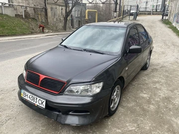 Авто Mitsubishi Lancer 2002 № 8636578