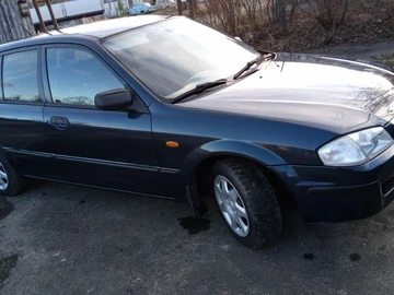 Авто Mazda 323 1999 № 8640924