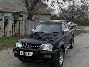 Авто Mitsubishi L 200 2003 № 8641424