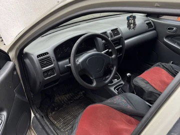 Авто Mazda 323 1997 № 8653948