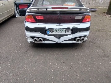 Авто Mazda 323 1996 № 8654134