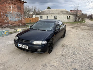 Авто Mazda 323 1997 № 8660064