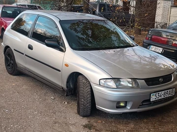 Авто Mazda 323 1997 № 8672064