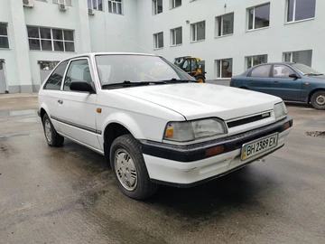 Авто Mazda Familia 1989 № 8676406