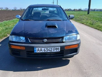 Авто Mazda 323 1996 № 8679657