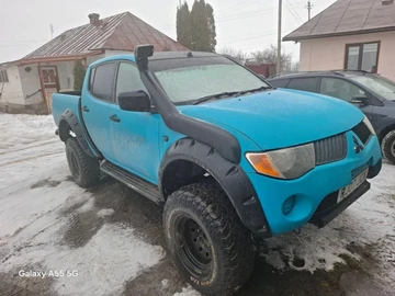 Авто Mitsubishi L 200 2009 № 8684326