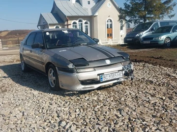 Авто Mazda 323 1996 № 8684955