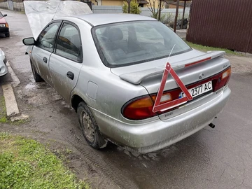 Авто Mazda 323 1996 № 8692250