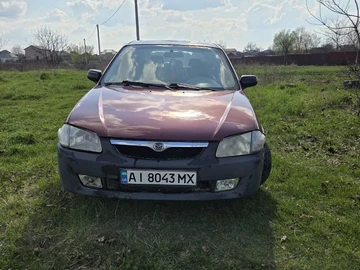 Авто Mazda 323 1999 № 8696686