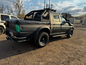Авто Mitsubishi L 200 2003 № 8699995