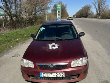 Авто Mazda 323 1999 № 8702039