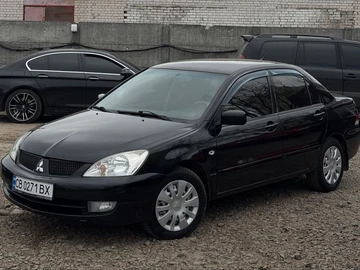 Авто Mitsubishi Lancer 2009 № 8702176