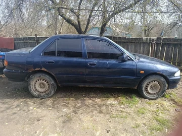 Авто Mitsubishi Lancer 1998 № 8703264