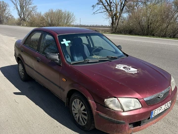 Авто Mazda 323 2001 № 8703687
